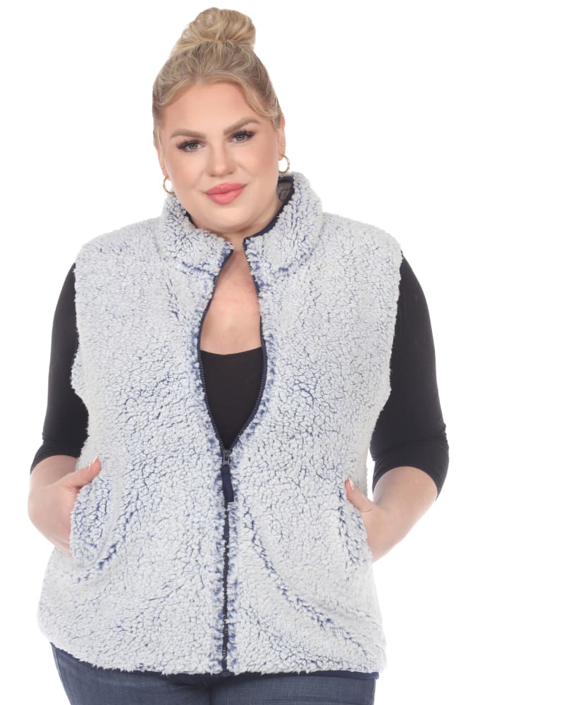 Front of a model wearing a size 3X Zip up sherpa vest in Sheep Blue by White Mark. | dia_product_style_image_id:247430